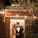 Lauren wore a strapless, fitted Carolina Herrera gown made of ivory and white silk rice tafetta -- a family heirloom. She accented the look with blue satin Manolo Blahnik pumps given to her by Taylor.