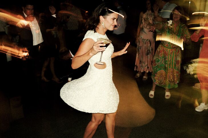 Bride in Short Dress With Cocktail Dancing at After-Party