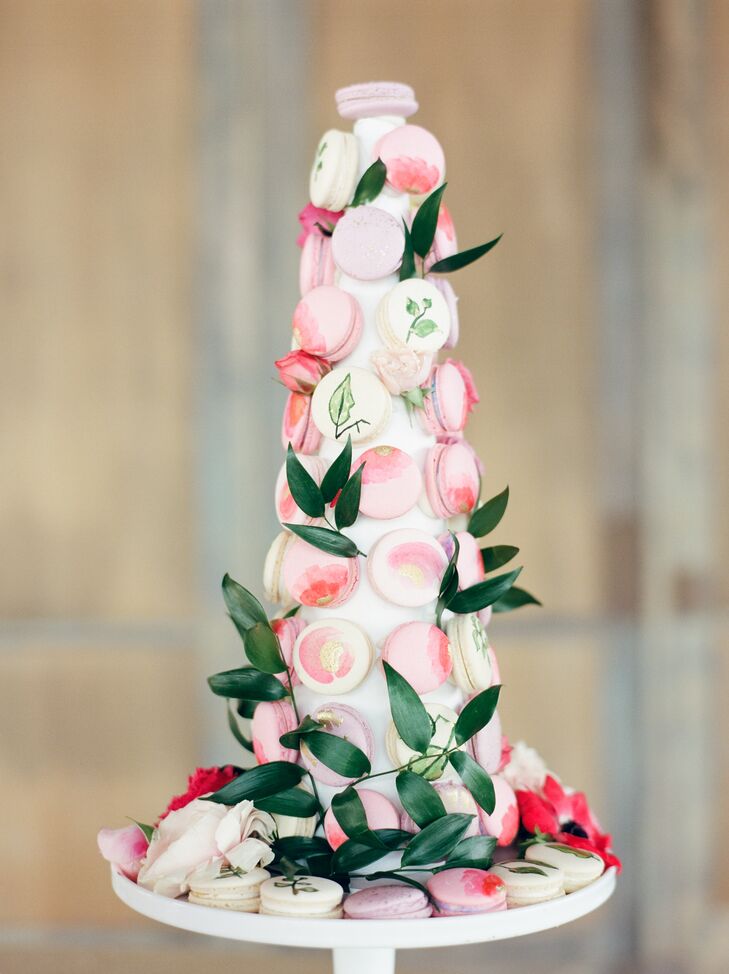 Buttercup Bakery crafted a tower to display a medley of French macarons, which the couple offered instead of a cake.