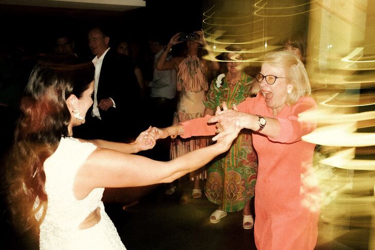 Alternative Photo Style of Bride Dancing With Guests at After-Party