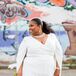 Modern Bride Wearing White Jumpsuit and Glam Diamond Necklace