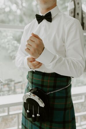 Groom Getting Ready and Putting on Kilt for Scottish Wedding