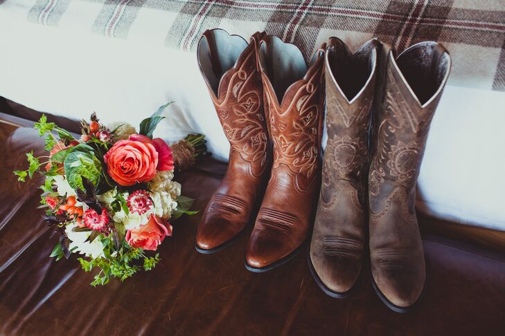 Jackie and Sarah both wore cowboy boots in different shades of brown, which were placed next to an ivory and pink bouquet.