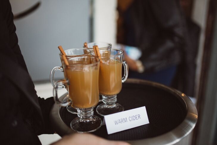 As guests arrived to the reception at The Carrington in Buda, Texas, they were greeted by a delicious selection of seasonal sips. Warm spiced cider, eggnog with nutmeg, and a Poinsettia Fizz flowed. They were paired with traditional Southern and Haitian fare, including deviled eggs and Creole duck.