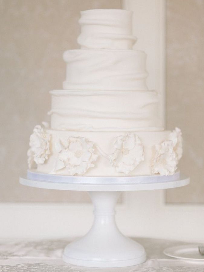 all-white fondant-covered wedding cake