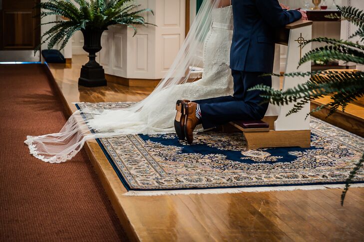 The bride and groom let their reception venue decide their ceremony location, and chose to have a traditional Catholic ceremony in a church close to the Nauticus Marina in Osterville, Massachusetts.