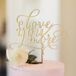 With three cakes, a gelato and sorbet bar, lemon bars and peach cobbler all at the reception, Priscilla and Daniel wanted to ensure that their wedding cake stood out. They had the chocolate sponge confection from Haydee Alegria covered in pink vanilla bean frosting and then accented with a sweet gold topper. Found at PS Wedding & Events, it read “Love you more.”