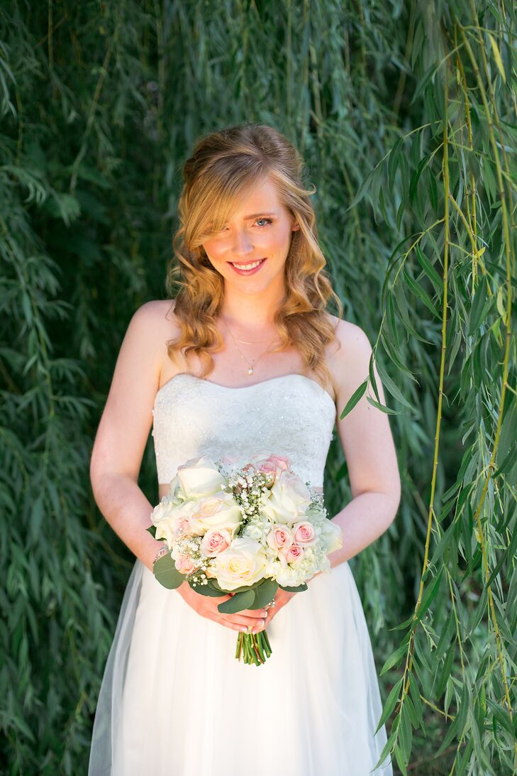 Katelyn found her A-line strapless gown with beaded bodice at David's Bridal.