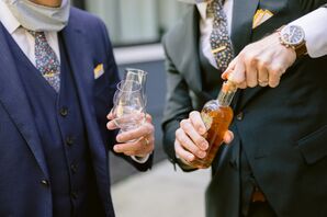 Couple Opening Bourbon After Burying the Bourbon Tradition