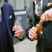 Couple Opening Bourbon After Burying the Bourbon Tradition