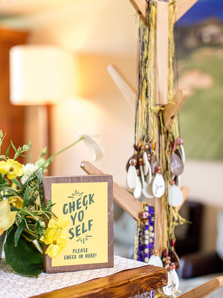 yellow sign beside name tags