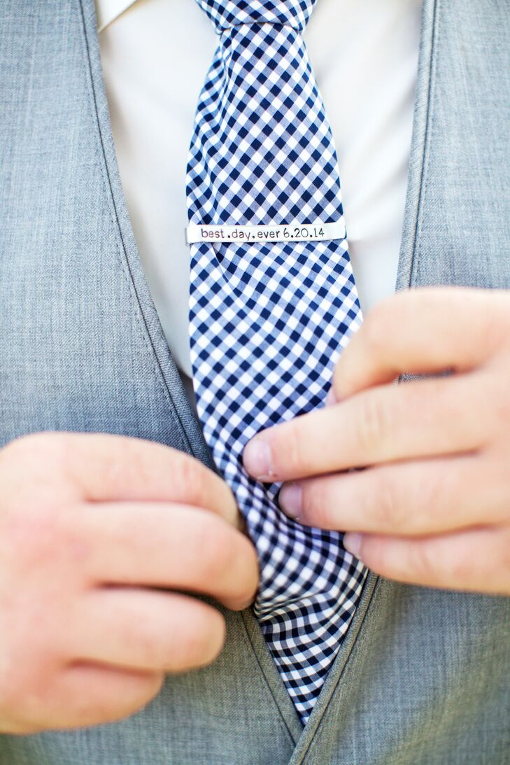Will wore a custom-engraved tie bar with a navy-and-white gingham tie.