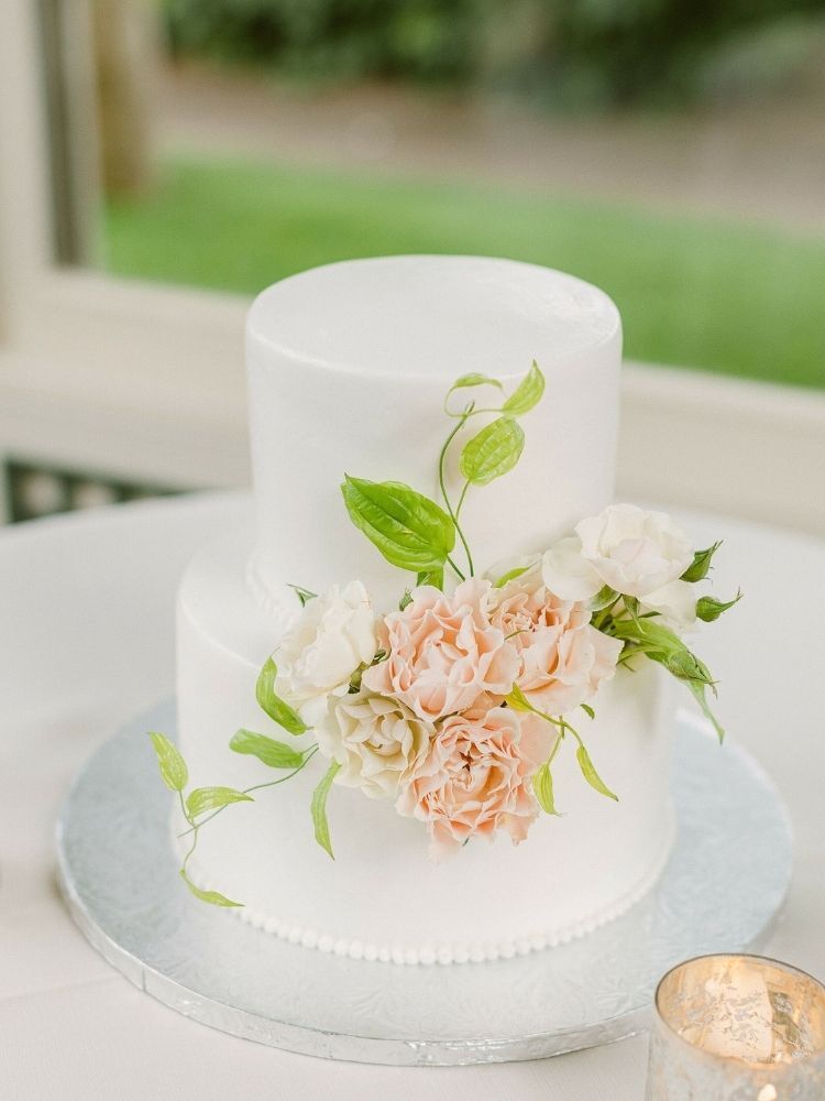 two-tier spring wedding cake with sugar flowers