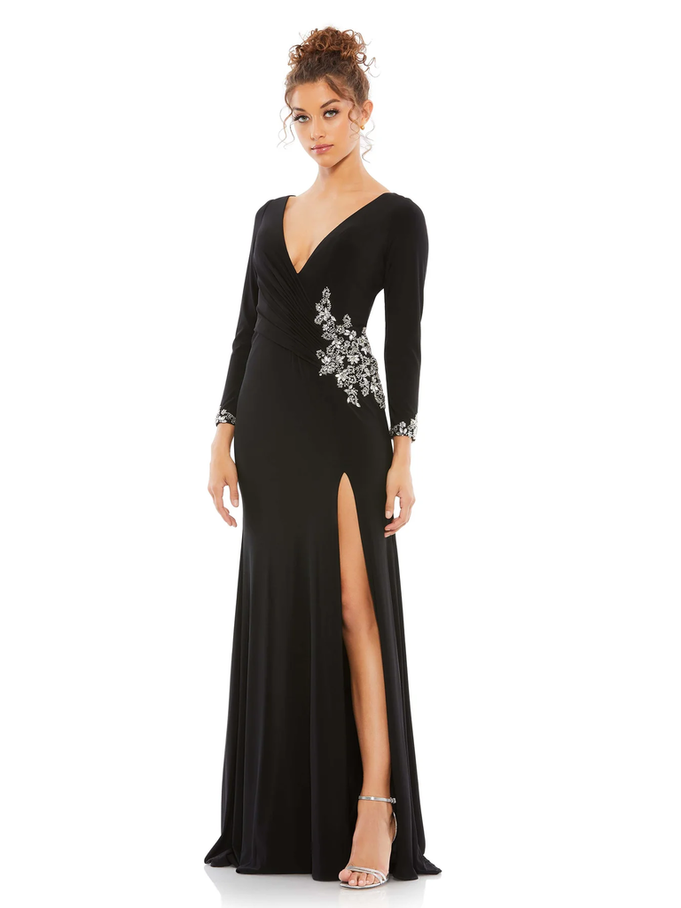 A model wears this floor-length floral gown with a high slit and V-neck.