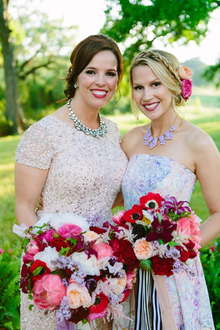 Instead of sticking to a color theme, Paige's bouquet included hues ranging from deep reds to pinks, lavender and even white. (She calls it "shades of lipstick.") Her bridal bouquet and her maid of honor's bouquet included peonies, garden roses, anemones, tulips, celosia, coxcomb, scabiosa, astilbes, lilacs, sweet peas, jasmine, clematis and more.