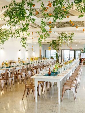 Reception With Copper Tolix Chairs and Ample Greenery