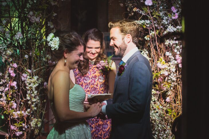 "My sister officiated, and our moms read a poem that we picked out," Tess says of the ceremony. It was just the couple's closest friends and family, and they decided against having a wedding party because of the limited space.