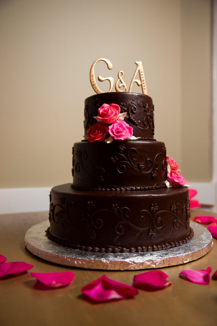 The couple opted for a dark chocolate cake with cherry preserves, frosted with chocolate ganache. Each piece was served with fresh berries and was a huge hit with guests.