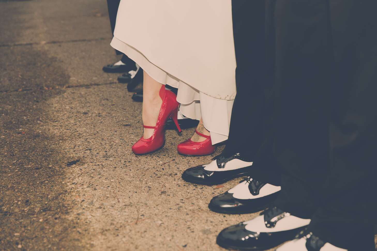 Vintage 1950s Black and White Wingtip Shoes and Red Pumps