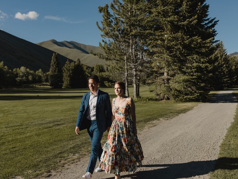 The couple walk hand-in-hand off into the sunset