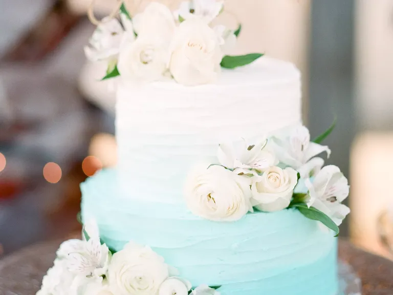 Blue and White Ombre Wedding Cake With Flowers