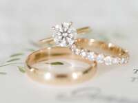 Stack of diamond engagement and wedding rings