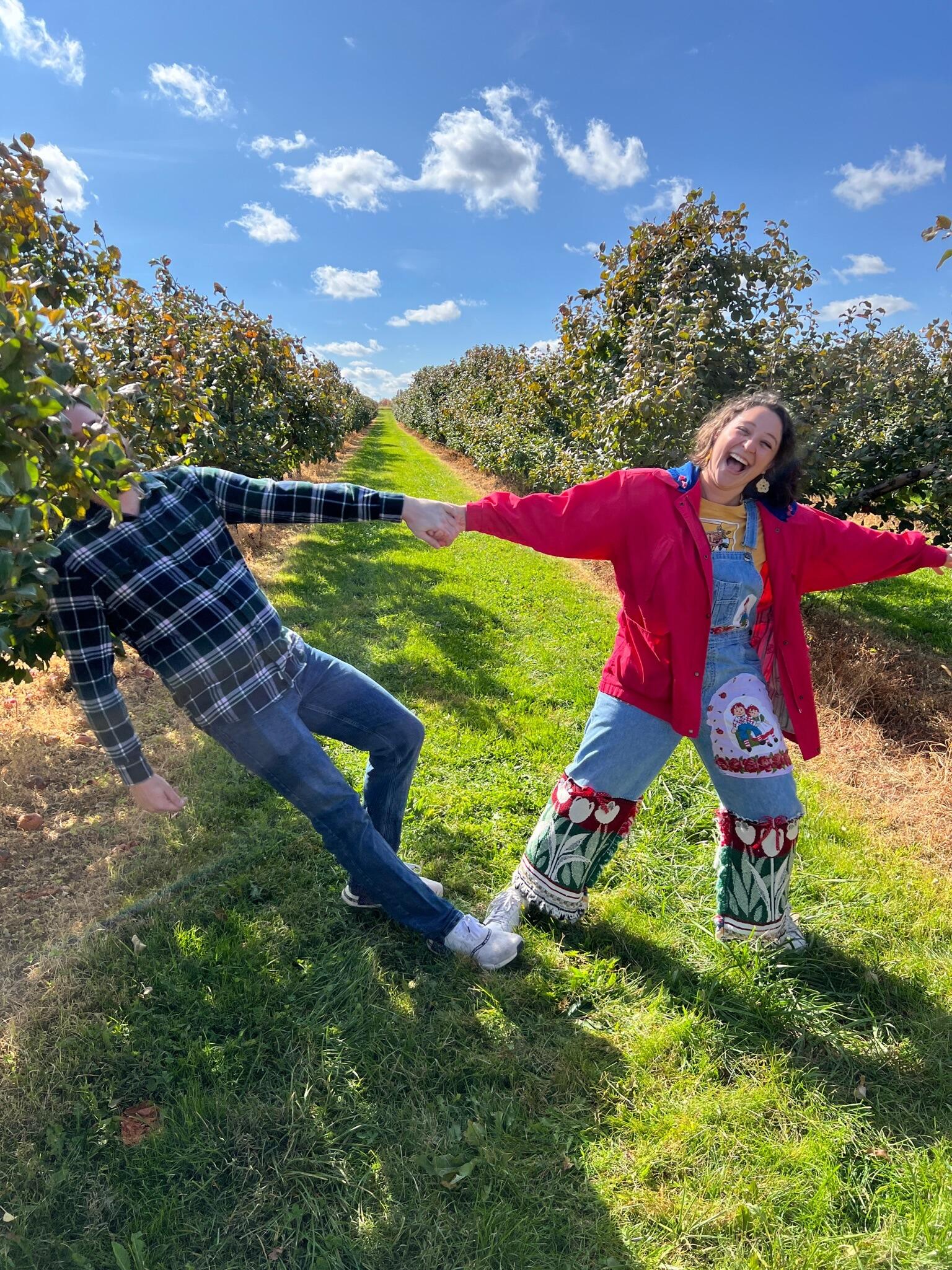 Eva steals the moment apple picking in Columbus to celebrate Hannah's birthday.
