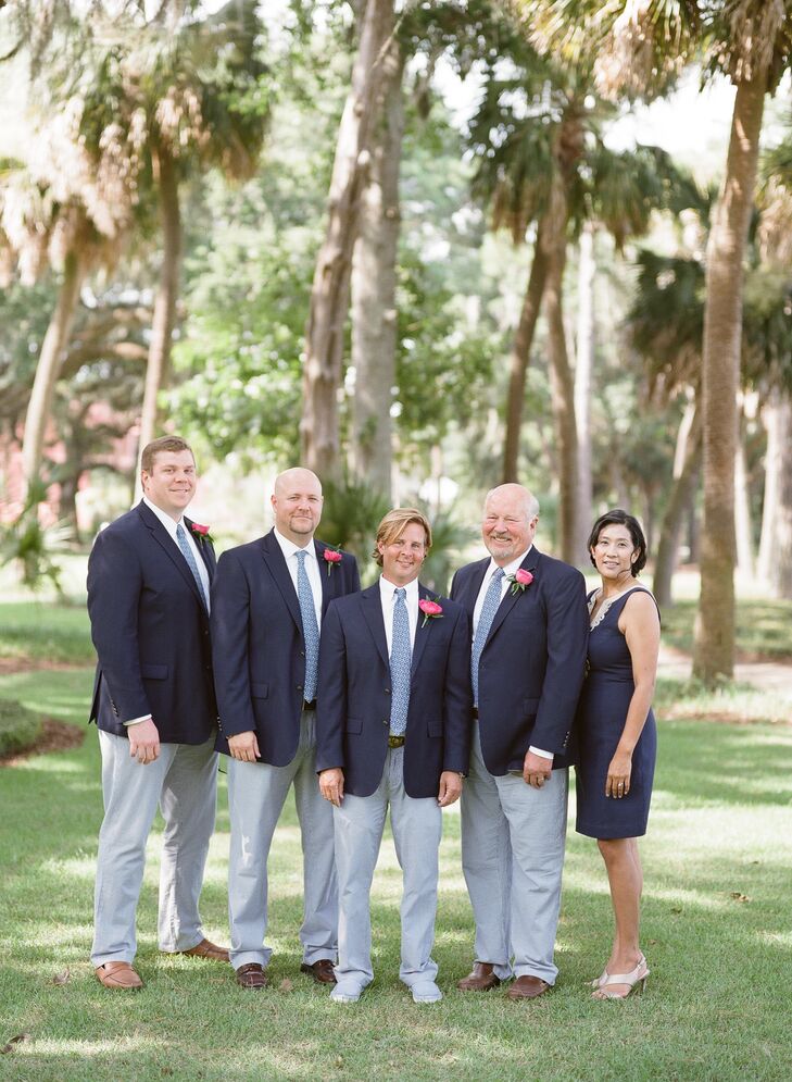 The groom and groomsmen wore seersucker pants, navy sport coats and Vineyard Vines ties with a Palmetto tree design. “David also wore his wedding gift from me, a Tag Heuer watch engraved with our initials and wedding date,” Lesley says.