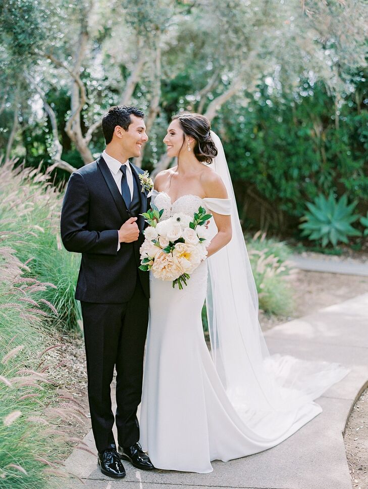 Paige Breon and Michael D'Arrigo wanted a classic, sophisticated wedding with romantic undertones and a soft color palette. The day started with a Cat