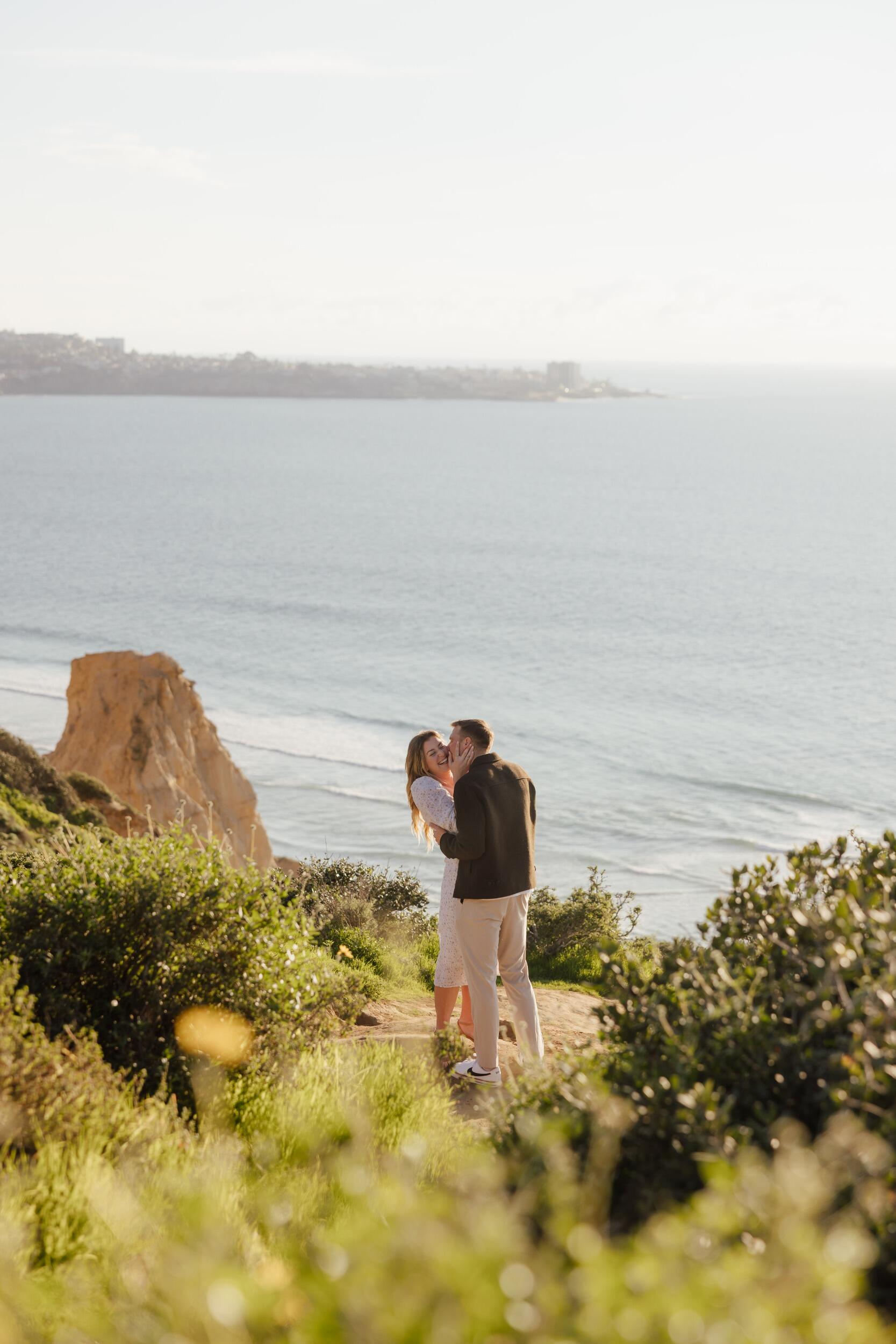 The proposal! I can't say I didn't know it was coming but I wasn't 100% sure it was this day. A little hike down to the most perfect spot he had scouted out at the Torrey Pines Glider Port months ago. I may have interrupted him mid speech to throw my purse but I can't help the photographer in me. I said yes, and then double checked with him that I said yes because I was so excited I wasn't sure if I blacked out lol. Shoutout to Hailey and Ella for hiding in the bushes and capturing all of these sweet moments!