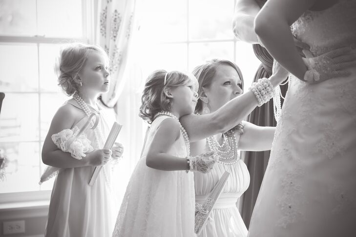 Vintage-Inspired Flower Girls with Pearls and Fans