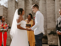 Couple participating in wedding ceremony order.
