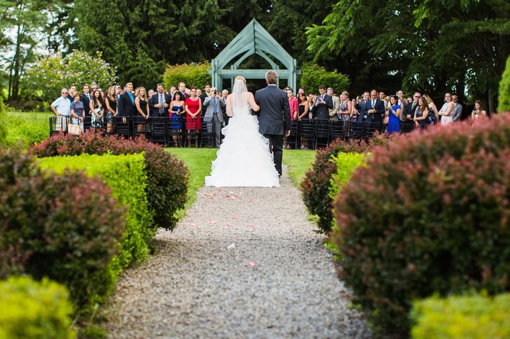 The natural landscape and gardens at the John Joseph Inn provided a gorgeous setting for the couple's outdoor ceremony.