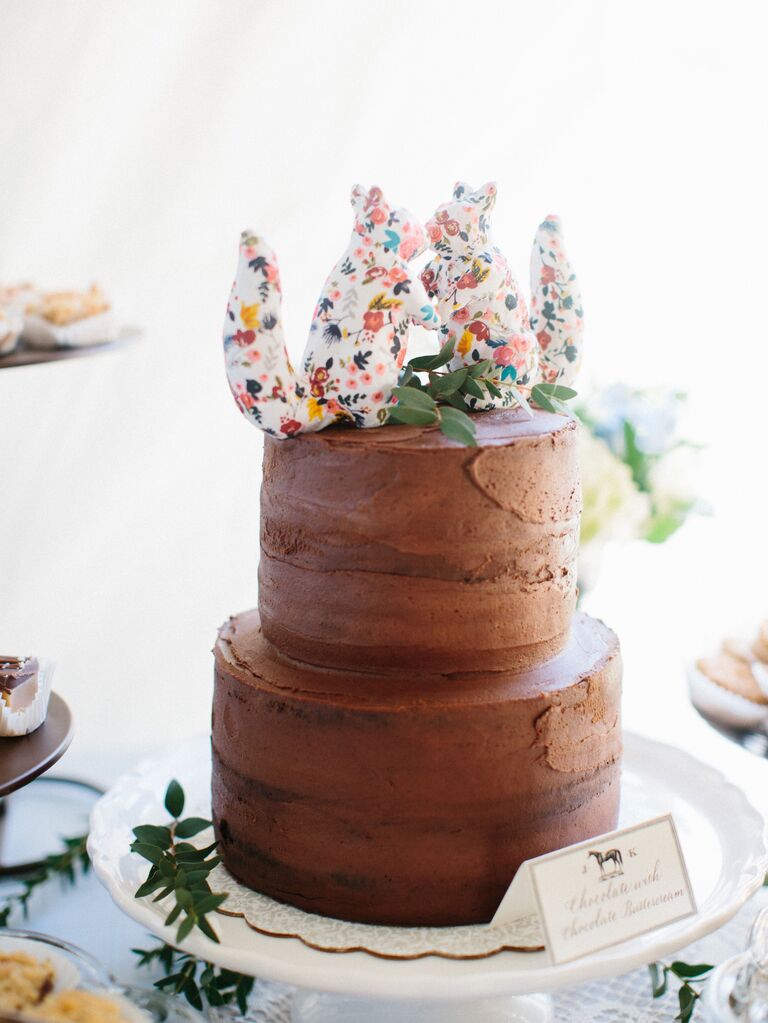 Colorful floral squirrels as animal-themed cake toppers. 