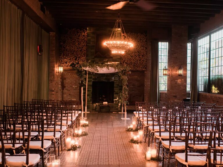 winter wedding ideas candle lined aisle