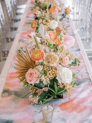Peach-Hued Centerpiece With Dried Palm Fronds