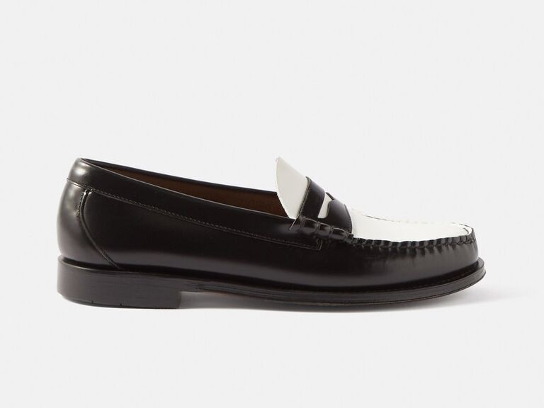 Black and white leather loafers. 