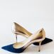 Kelly's pointy Jimmy Choo pumps faded from navy blue satin to gold.