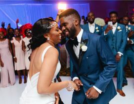 Bride and groom dancing at wedding reception