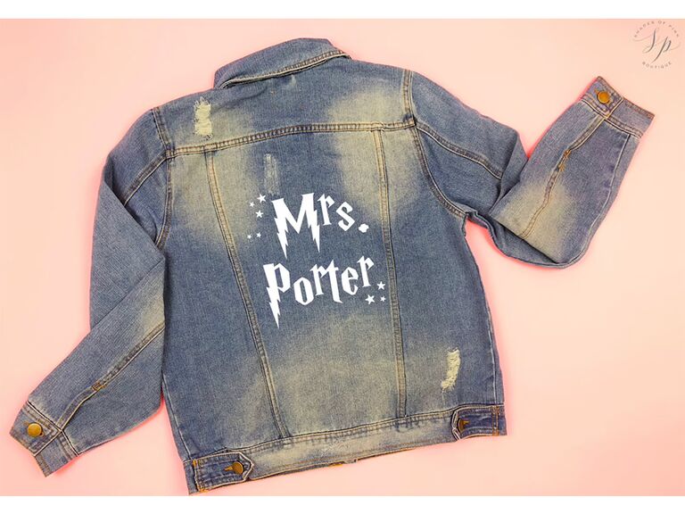 Denim jacket with personalized name in white HP font
