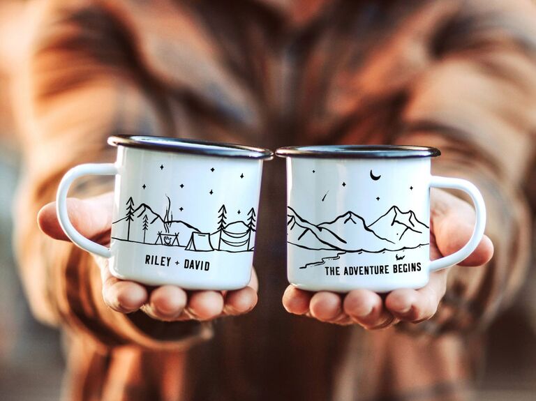 Matching camp mugs read The Adventure Begins with personalized names engagement gifts from parents