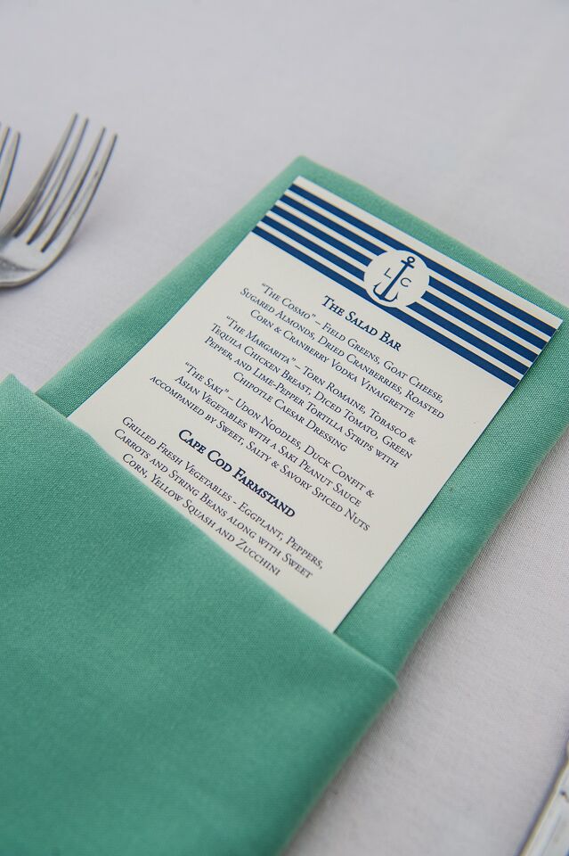 The bride and groom did a raw bar during their cocktail hour with oysters and shrimp, to play up their nautical themed wedding. For the main reception, they strayed from a strictly seafood menu and set up food stations with assorted gourmet dishes.