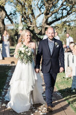 Couple Recessing at Outdoor Ceremony at the Flying V Ranch in Decatur, Texas