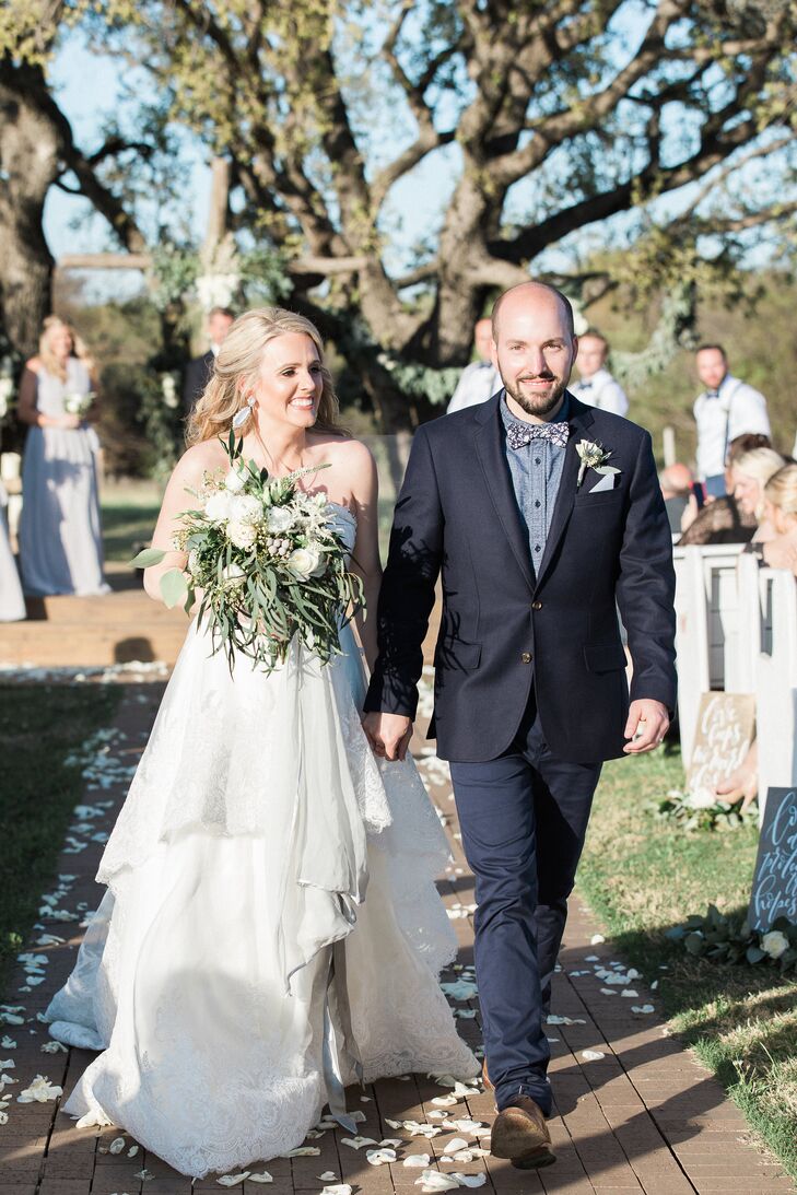 Couple Recessing at Outdoor Ceremony at the Flying V Ranch in Decatur, Texas