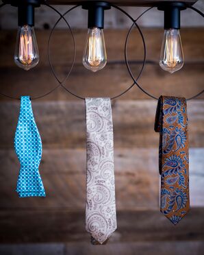 Ties and Bow Tie Hanging From Rings