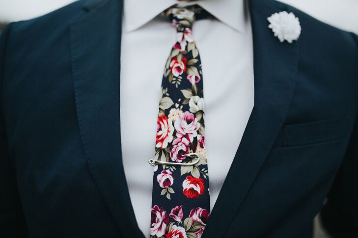 Justin's personality shined through in his colorful floral tie and fish hook tie clip.