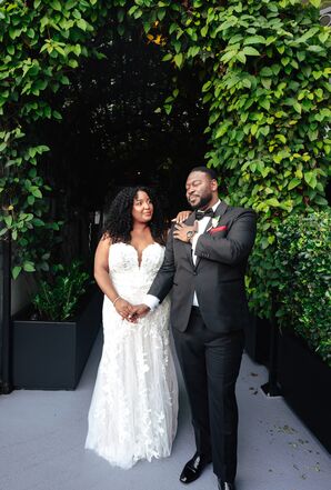 Bride in Fitted Gown With Floral Appliqués and Lace Detailing, Groom in Classic Tuxedo