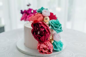 Single-Tier White Cake With Colorful Flowers in Blue, Pink and Red With Gold Accents