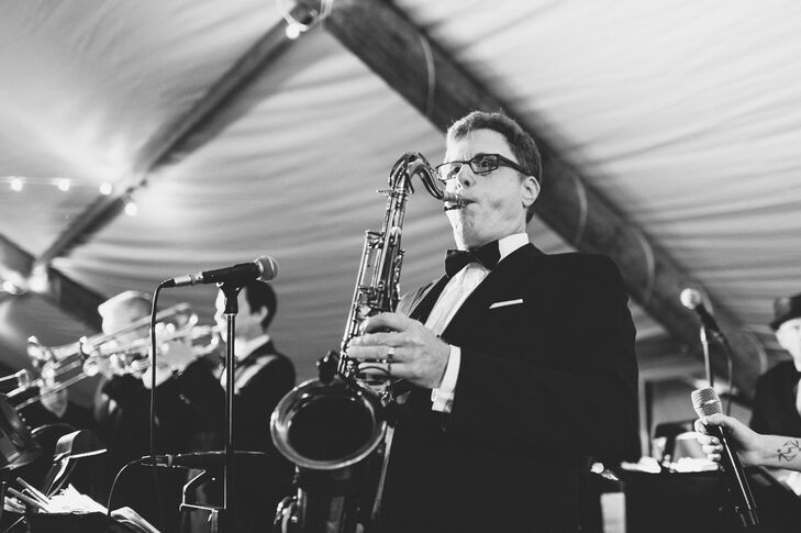 Chicago-based performers Ken Arlen Orchestra played Motown hits for guests during the couple's tented reception. During dinner, the band leader even surprised the bride by playing her favorite Beatles song, 'Blackbird'.