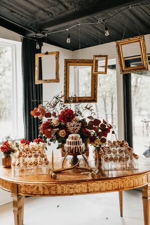 Picture Frames Hanging Over Dessert Table